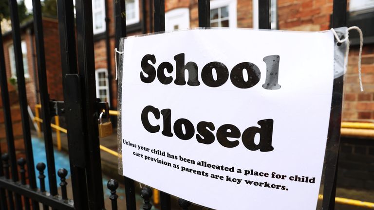 File photo dated 30/03/20 of a sign on the gates of a closed school. School closures during the Covid-19 lockdown could leave disadvantaged children with a "learning loss" of up to six months, social mobility experts have warned.