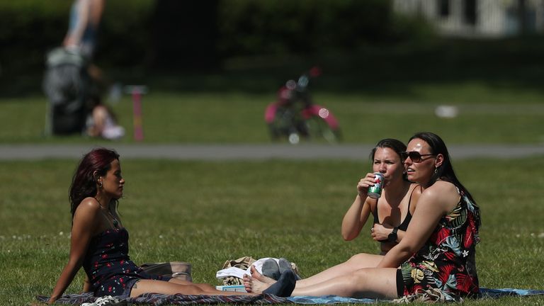 Sunbathers in Greenwich Park, London, as the UK continues in lockdown to help curb the spread of the coronavirus.