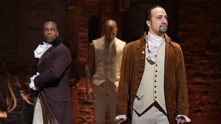 NEW YORK, NY - FEBRUARY 15:  Actor Leslie Odom, Jr. (L)  and actor, composer Lin-Manuel Miranda (R) perform on stage during "Hamilton" GRAMMY performance for The 58th GRAMMY Awards at Richard Rodgers Theater on February 15, 2016 in New York City.  (Photo by Theo Wargo/WireImage)