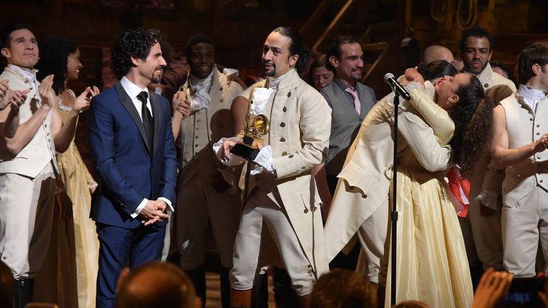 NEW YORK, NY - FEBRUARY 15: Music director Alex Lacamoire and actor, composer Lin-Manuel Miranda and cast of "Hamilton" celebrate on stage the receiving of GRAMMY award after "Hamilton" GRAMMY performance for The 58th GRAMMY Awards at Richard Rodgers Theater on February 15, 2016 in New York City. (Photo by Theo Wargo/Getty Images)