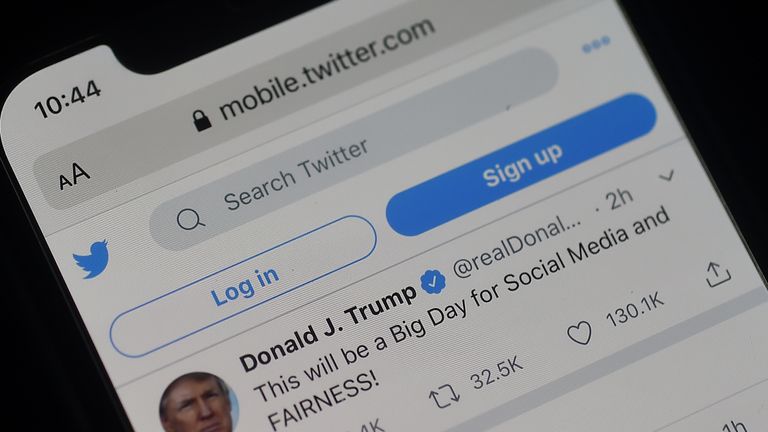 The twitter page of US President Donald Trump's is displayed on a mobile phone on May 28, 2020, in Arlington, Virginia. - Trump is expected to sign an executive order on May 28, 2020, after threatening to shutter social media platforms following Twitter's move to label two of his tweets misleading. (Photo by Olivier DOULIERY / AFP) (Photo by OLIVIER DOULIERY/AFP via Getty Images)