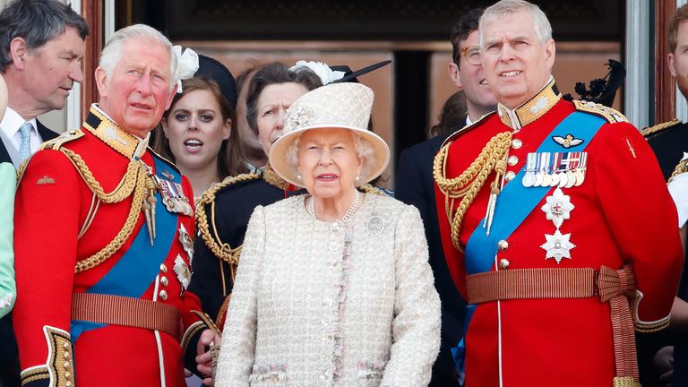 Prince Charles, Prince of Wales, Queen Elizabeth II and Prince Andrew, Duke of York watch a flypast from the balcony of Buckingham Palace during Trooping The Colour, the Queen's annual birthday parade, on June 8, 2019 in London, England