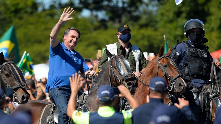 Brazilian President Jair Bolsonaro horse-riding during..a demonstration..in favor of his government amidst the coronavirus pandemic in front of Planalto Palace on May 31, 2020 in Brasilia, Brazil