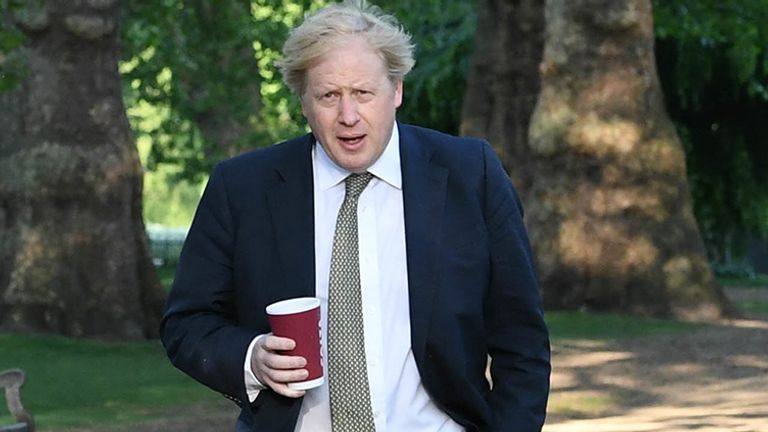 Boris Johnson takes a morning walk in St James&#39;s Park in London before returning to Downing Street