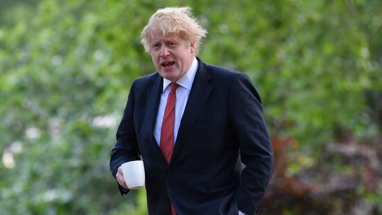 Prime Minister Boris Johnson takes a morning walk in St James&#39;s Park in London