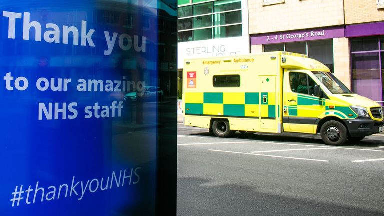 An emergency ambulance drives past a digital poster in Wimbledon thanking the NHS staff who have been caring for patients with covid-19 symptoms as the lockdown continues.

24 May 2020