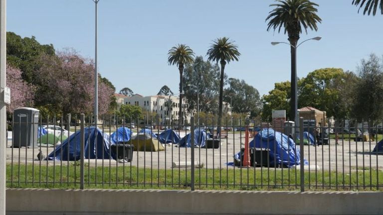 Tents have sprung up in wealthy districts