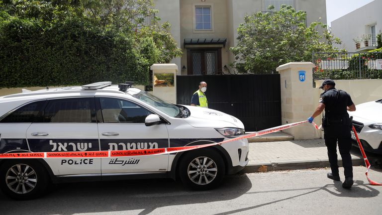 Police cordon off an area near the house of Du Wei in Herzliya, near Tel Aviv
