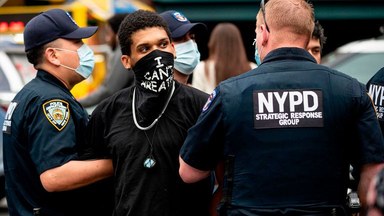 Protesters clash with police during a rally against the death of Minneapolis, Minnesota man George Floyd at the hands of police on May 28, 2020 in Union Square in New York City