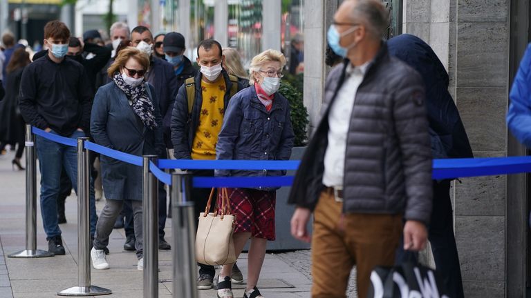 Shoppers step out in Berlin as Germany carefully lifts its lockdown