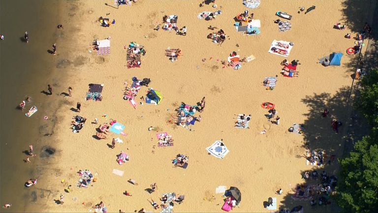 Social distancing was still visible, mostly, as people spent time in parks and at beaches in the sunshine