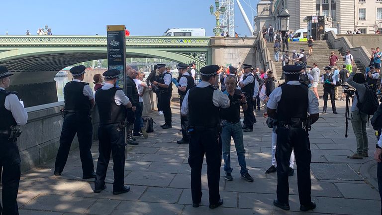 Police attempt to disperse the gathering in London. Pic: Anthony Joseph