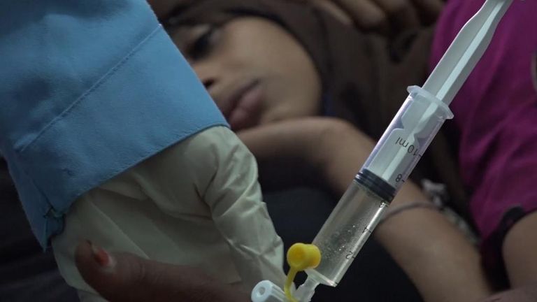 Yemen, woman with a drip at a hospital in Taiz