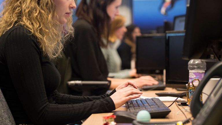 Office workers will be asked to sit side-to-side or facing away from each other if possible