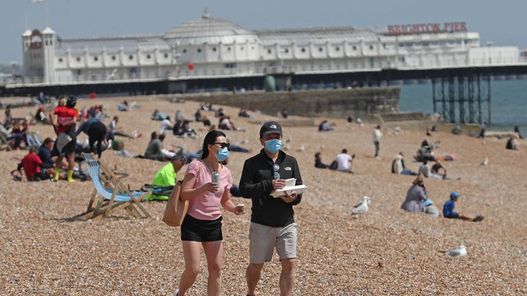 People on Brighton beach on Saturday after the introduction of measures to bring the UK out of lockdown