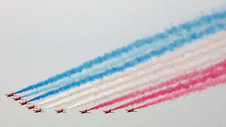 Mandatory Credit: Photo by David Taylor/Shutterstock (10639956a).A flypast by the Red Arrows over London as Britain celebrates VE Day..VE Day, London, UK - 08 May 2020