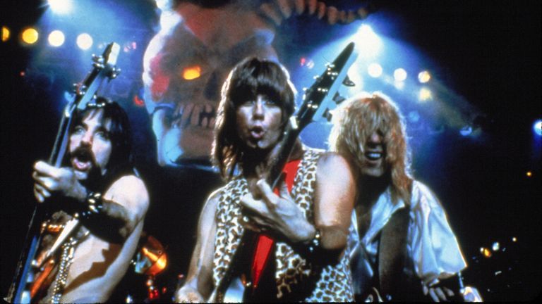 F6F9GH RELEASE DATE: March 2, 1984   MOVIE TITLE: This Is Spinal Tap   DIRECTOR: Rob Reiner  STUDIO: Spinal Tap Prod.   PLOT: In 1982 legendary British heavy metal band Spinal Tap attempt an American comeback tour accompanied by a fan who is also a film-maker. The resulting documentary, interspersed with powerful performances of Tap&#39;s pivotal music and profound lyrics, candidly follows a rock group heading towards crisis, culminating in the infamous affair of the eighteen-inch-high Stonehenge stage prop   PICTURED: MICHAEL MCKEAN as David St. Hubbins, CHRISTOPHER GUEST as Nigel Tufnel and HARRY SHEAR