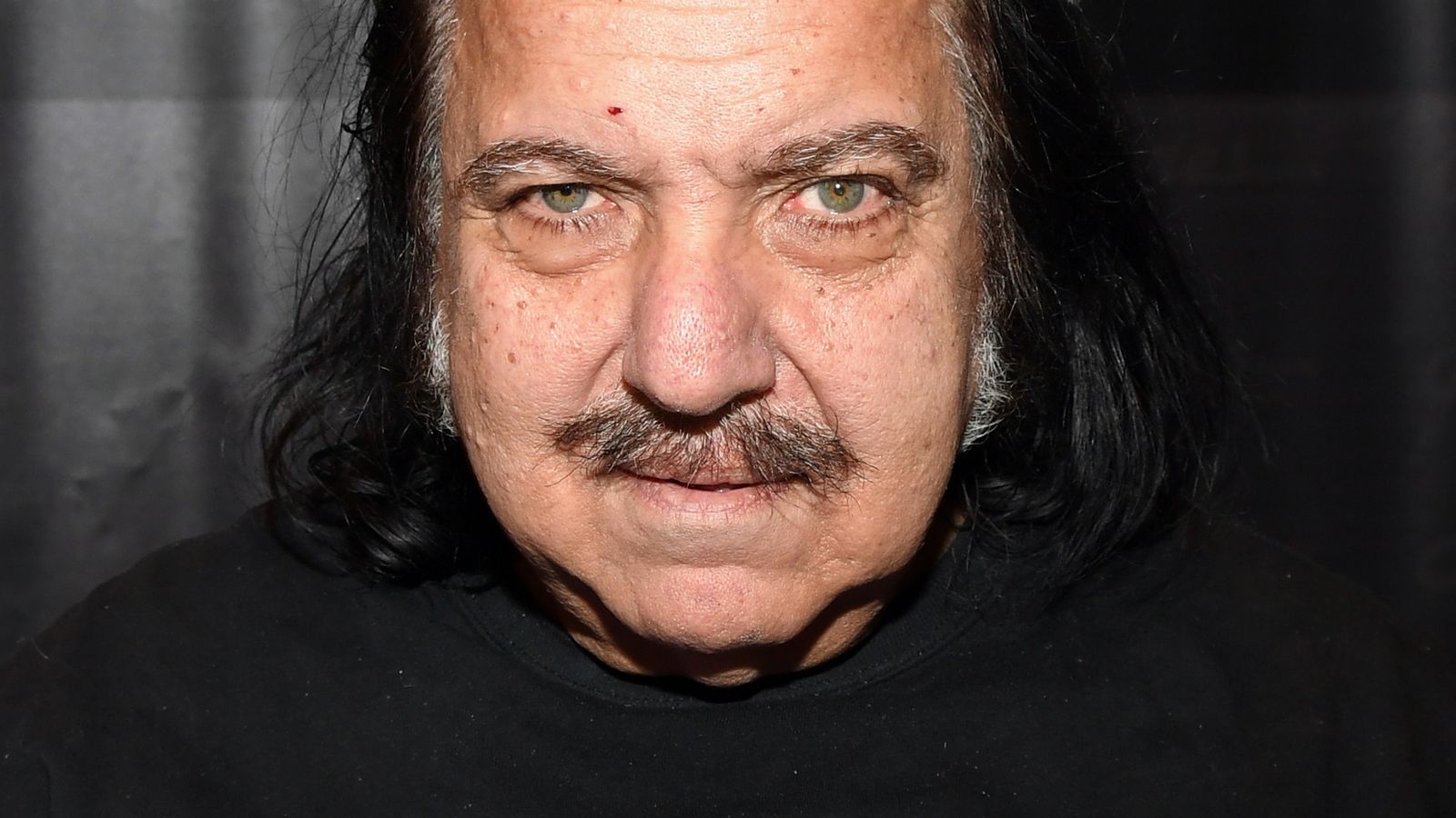 Porn star Ron Jeremy charged with raping three woman and sexual assault of ...
