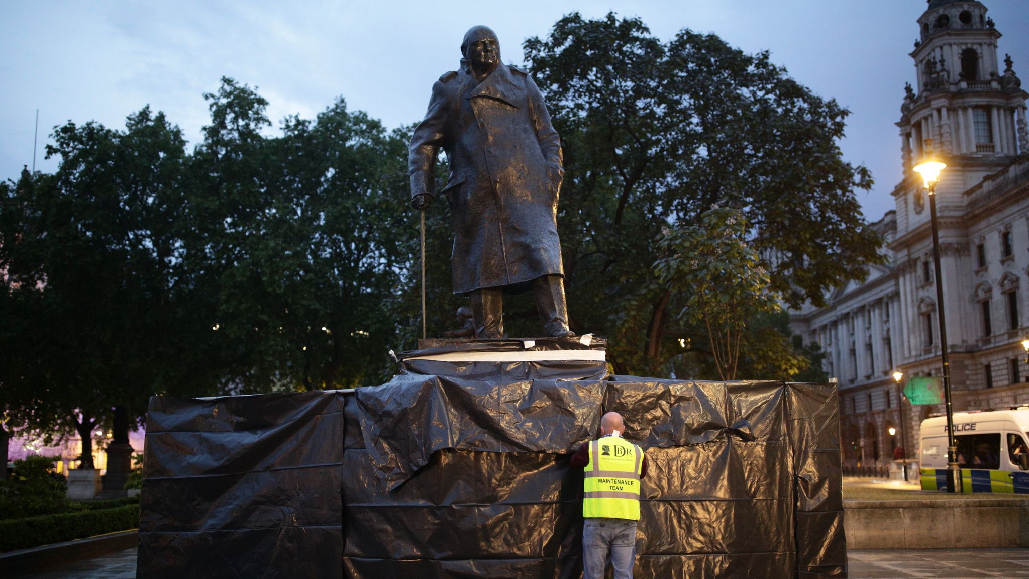 Winston Churchill statue boarding removed for Macron's visit to London
