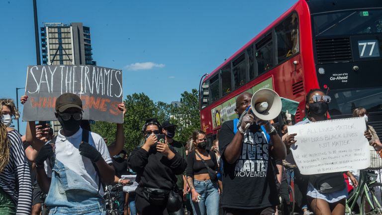 LONDON, ENGLAND - MAY 31: Thousands of young people join a spontaneous Black Lives Matter march through central London to protest the death of George Floyd in Minneapolis and in support of the demonstrations in North America on May 31, 2020 in London, United Kingdom. African-American George Floyd, 46, died in police custody after being arrested outside a shop in Minneapolis, Minnesota. Footage of the arrest shows a white police officer, Derek Chauvin, kneeling on George Floyd’s neck while he was pinned to the floor. The death has lead to protests across the US. (Photo by Guy Smallman/Getty Images)