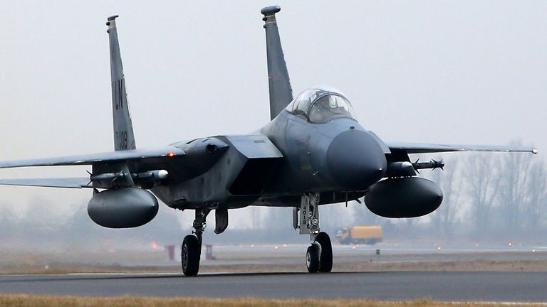 A US Air Force F-15C Eagle is seen at the airfield near Siauliai Zuokiniai, Lithunaia on March 6, in 2014. The United States sent six additional F-15 fighter jets to step up NATO&#39;s air patrols over the Baltic states, mission host Lithuania said as West-Russia tensions simmered over Ukraine. AFP PHOTO / PETRAS MALUKAS (Photo credit should read PETRAS MALUKAS/AFP via Getty Images)