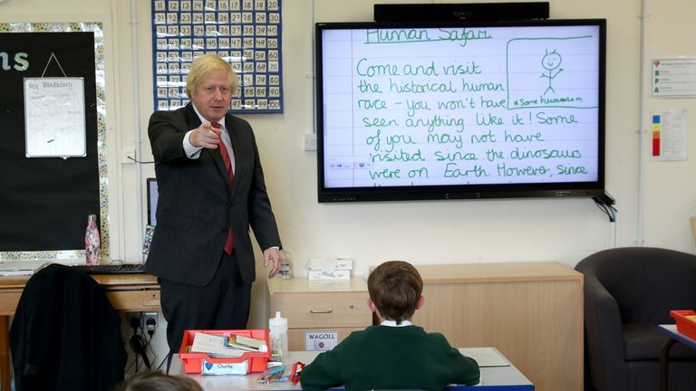 BOVINGDON, ENGLAND - JUNE 19: Prime Minister Boris Johnson joins a socially distanced lesson during a visit to Bovingdon Primary School on June 19, 2020 near Hemel Hempstead. The Government have announced a GBP 1 billion plan to help pupils catch up with their education before September after spending months out of school during the coronavirus lockdown. (Photo by Steve Parsons - WPA Pool/Getty Images)