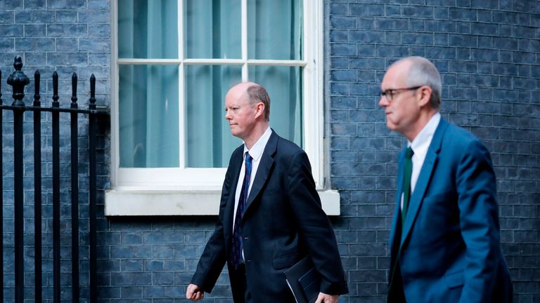 Chief Medical Officer Chris Whitty (L) and Britain's Chief Scientific Adviser Patrick Vallance (R) arrive at 10 Downing street in central London on April 9, 2020 to take part in the daily government coronavirus briefing. - British Prime Minister Boris Johnson on Thursday began a fourth day in intensive care "improving" in his battle with coronavirus, as his government prepared to extend a nationwide lockdown introduced last month. (Photo by Tolga AKMEN / AFP) (Photo by TOLGA AKMEN/AFP via Getty Images)