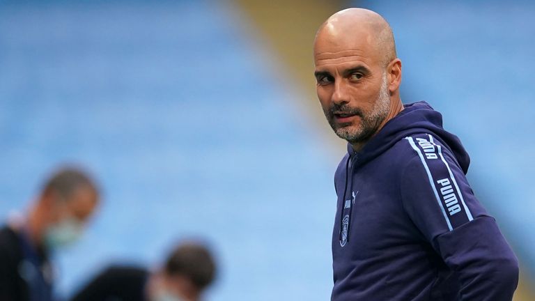 Manchester City's Spanish manager Pep Guardiola reacts in front of empty stands ahead of the English Premier League football match between Manchester City and Arsenal at the Etihad Stadium in Manchester, north west England, on June 17, 2020. - The Premier League makes its eagerly anticipated return today after 100 days in lockdown but behind closed doors due to coronavirus restrictions. (Photo by DAVE Thompson / POOL / AFP) / RESTRICTED TO EDITORIAL USE. No use with unauthorized audio, video, data, fixture lists, club/league logos or 'live' services. Online in-match use limited to 120 images. An additional 40 images may be used in extra time. No video emulation. Social media in-match use limited to 120 images. An additional 40 images may be used in extra time. No use in betting publications, games or single club/league/player publications. /  (Photo by DAVE THOMPSON/POOL/AFP via Getty Images)