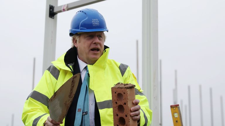 Britain's Prime Minister Boris Johnson lays a brick during a Conservative Party general election campaign visit to Barratt Homes's 'Willow Grove' residential housing development in Bedford, east England on November 21, 2019. - Britain will go to the polls on December 12, 2019 to vote in a pre-Christmas general election. (Photo by Dan Kitwood / POOL / AFP) (Photo by DAN KITWOOD/POOL/AFP via Getty Images)