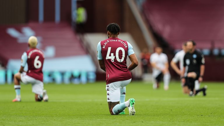 Aston Villa players take a knee in support of the Black Lives Matter campaign