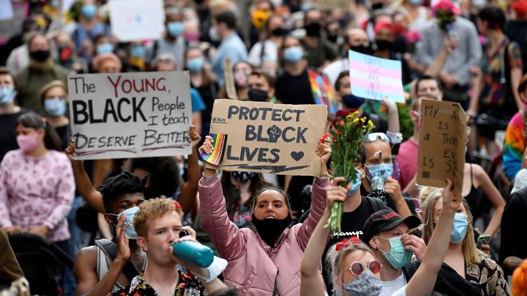 People take part in a Black Trans Lives Matter rally in London, Britain, June 27, 2020. REUTERS/Toby Melville

