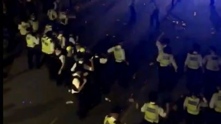 15 police officers were injured during the confrontation with those at a street party