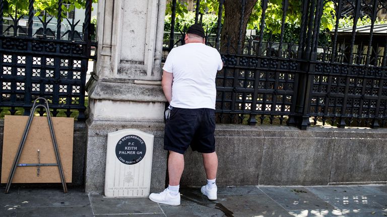 London, UK. 13th June, 2020. A far right protester unirates on PC Keith Palmer memorial out side the houses of parliment. The protests are retaliation to the recent George Floyd deonstrations by Black lives Matter. Credit: Thabo Jaiyesimi/Alamy Live News - Image ID: 2C10RW2 (RM)