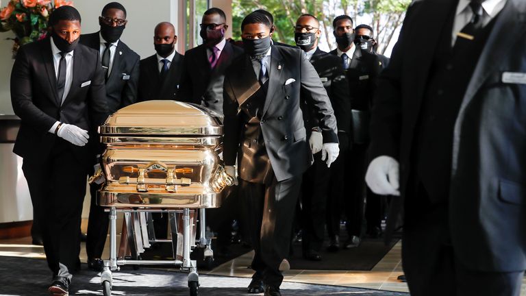 Pallbearers bring the coffin into the church for the funeral for George Floyd, outside The Fountain of Praise church in Houston, Texas, U.S., June 9, 2020. Godofredo A. Vasquez/Pool via REUTERS