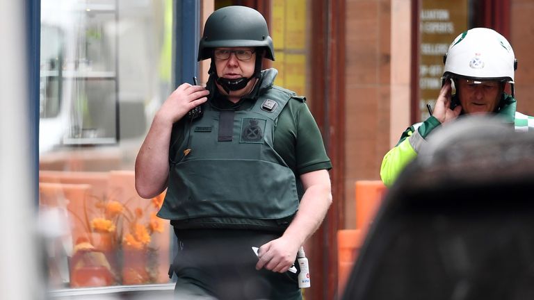 GLASGOW, SCOTLAND - JUNE 26: Ambulance crew members at the scene after reports of three people being killed in a central Glasgow hotel on June 26, 2020 in Glasgow, Scotland. A knifeman stabbed three people to death in the stairwell of the Park Inn Hotel on West George Street, Glasgow before being shot himself by armed police. The Scottish Police Federation (SPF) said an officer was stabbed during the major incident. (Photo by Jeff J Mitchell/Getty Images)