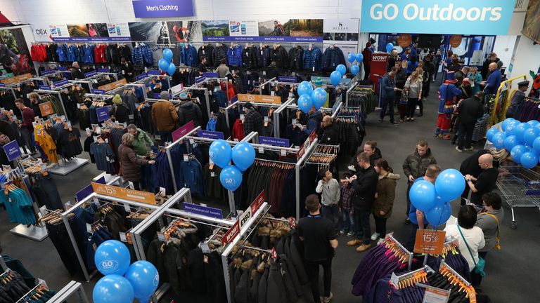 Members of the public walk into the newly opened GO Outdoors store in Nottingham