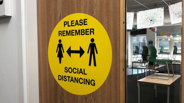 Signs are in place at Handcross Primary School to remind pupils about social distancing