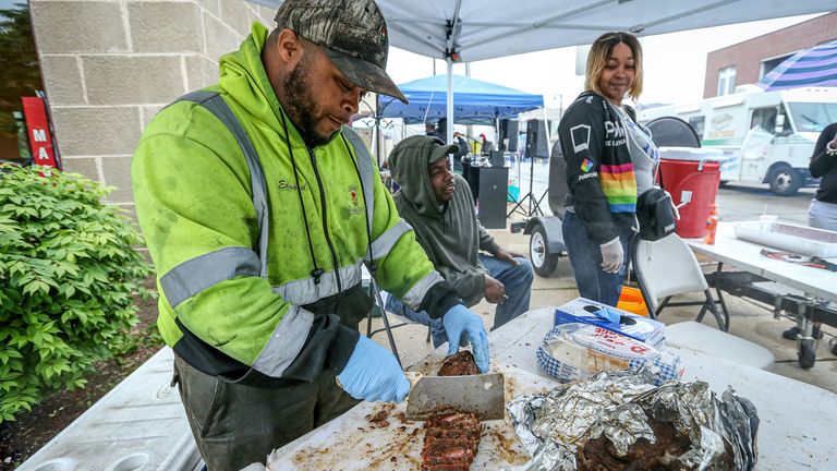 A vendor prepares food during the 48th Annual Juneteenth Day Festival in 2019, in Milwaukee
