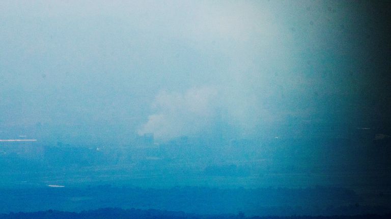 Kaesong Industrial Complex is shrouded by smoke in this picture taken from the south side in Paju, South Korea, June 16, 2020. Yonhap via REUTERS ATTENTION EDITORS - THIS IMAGE HAS BEEN SUPPLIED BY A THIRD PARTY. SOUTH KOREA OUT. NO RESALES. NO ARCHIVE.