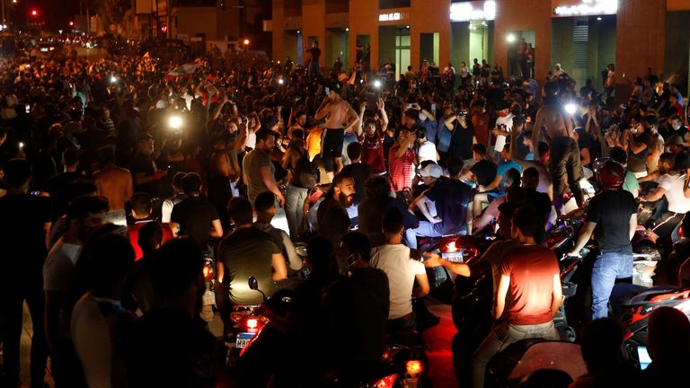 Protesters are seen gathering together in Beirut during the demonstrations on Thursday