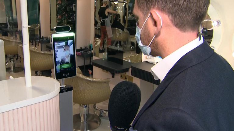 Sky's Ireland correspondent, Stephen Murphy, is seen having his temperature taken