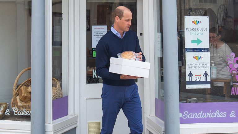 EMBARGOED to 1300 BST Friday June 19, 2020. The Duke of Cambridge carrying baked goods and pastries as he leaves Smiths the Bakers, in the High Street in King&#39;s Lynn, Norfolk.