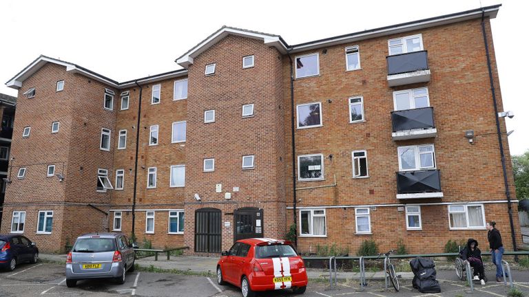 The block of flats where Saadallah is believed to live on the top floor was searched
