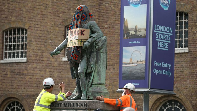 A statue of slave owner Robert Milligan at West India Quay, east London, has been removed