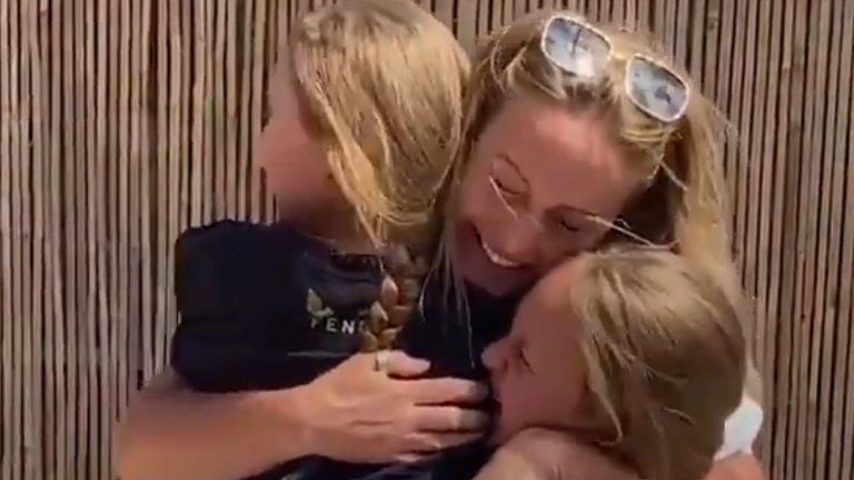 The girls cried when they saw their mother