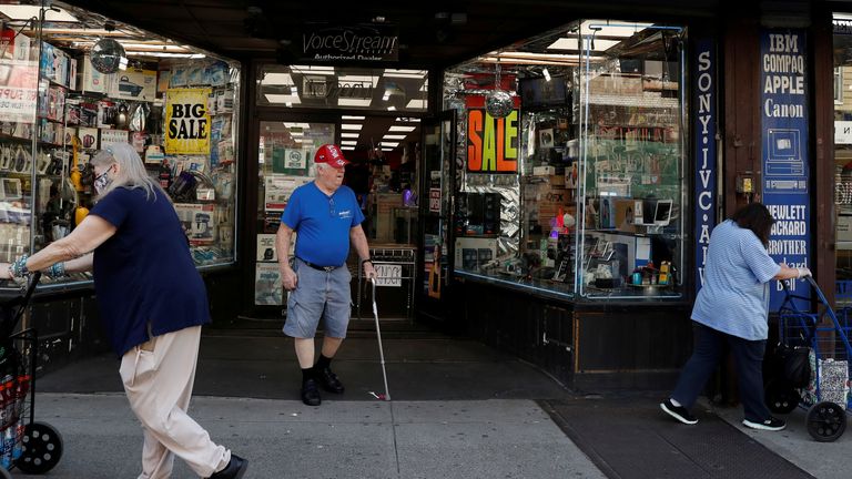 Shoppers are seen outside a retail store as the phase one reopening of New York City continues during the outbreak of the coronavirus disease (COVID-19) in the Brooklyn borough of New York City, New York, U.S. June 9, 2020