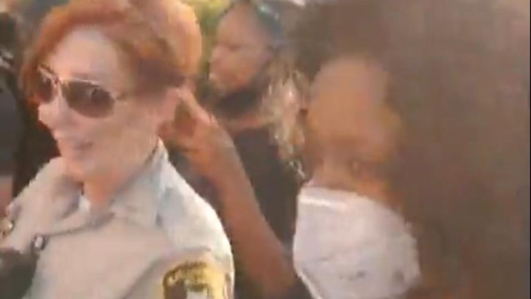 Police walked side by side with protesters during a March for Peace in Las Vegas, Nevada, on June 3.

Facebook Live footage co-organizer Latasha Pippen at the front of the march with the officers behind her.