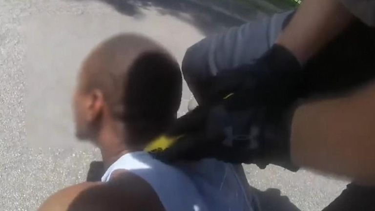 Officer striking man with stun gun