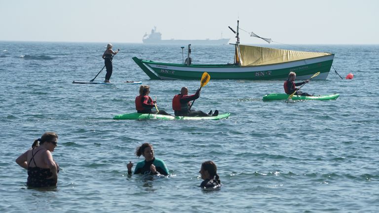 People enjoyed the warm weather in Cullercoats Bay, Tyne and Wear on Wednesday