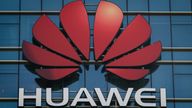huawei logo and building